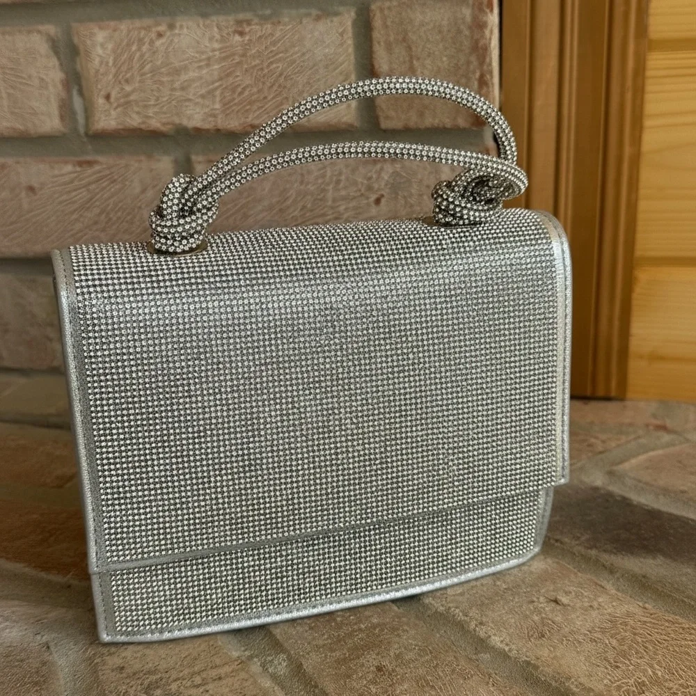 NWT Urban Expressions Silver Clutch/Purse with handle and matching chain straps.